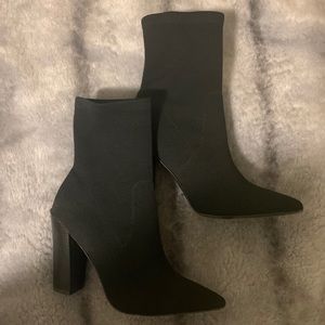 Call It Spring Black Sock Booties in a size 8.5 US